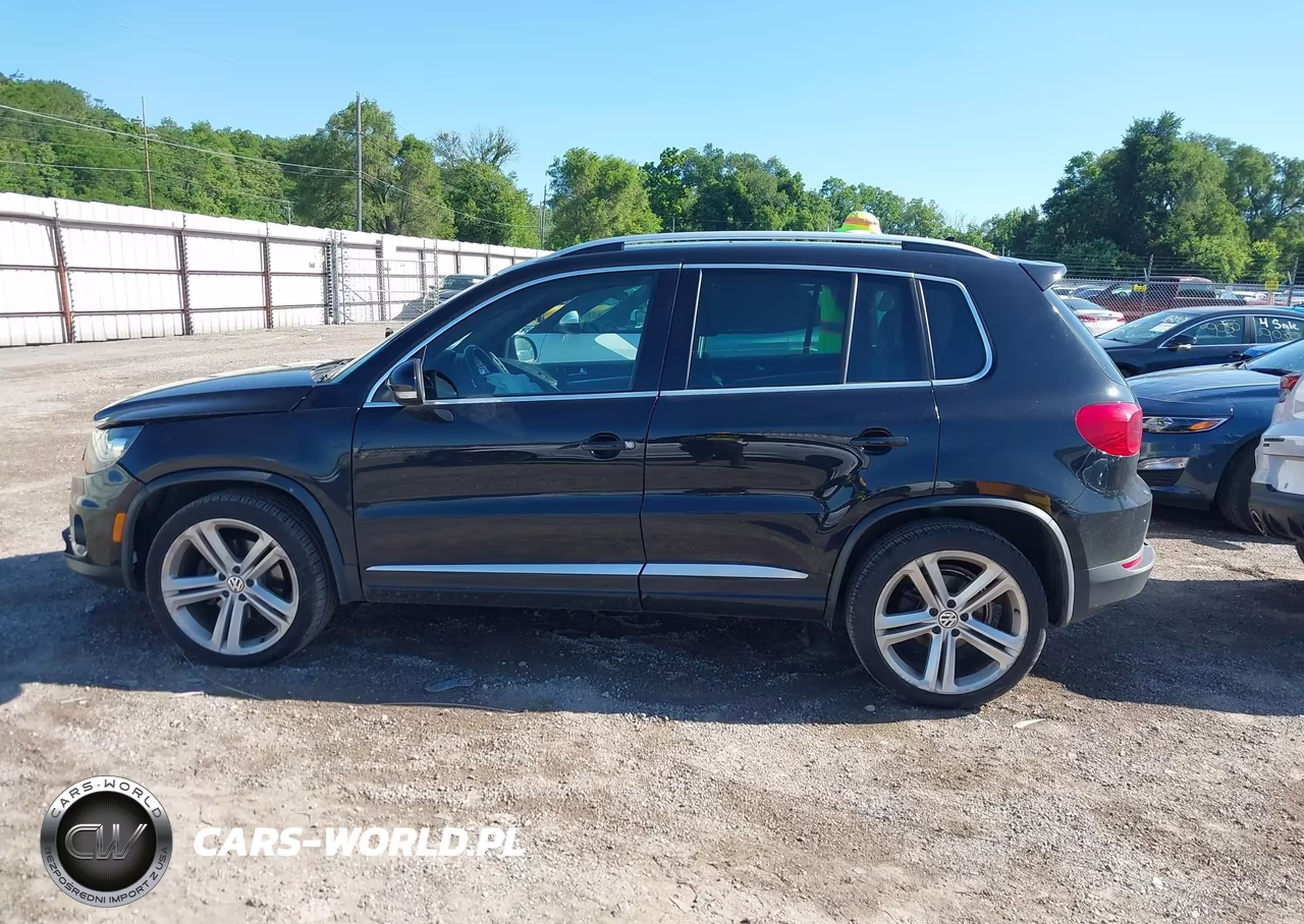 2014 Volkswagen Tiguan R-Line VIN:WVGBV3AX5EW099793 - 14
