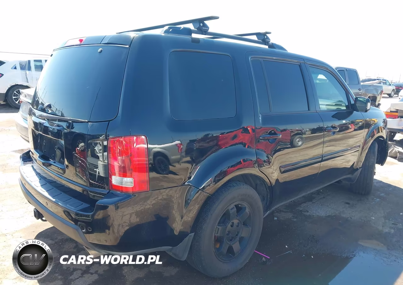 2011 Honda Pilot Touring VIN:5FNYF4H96BB088410 - 4
