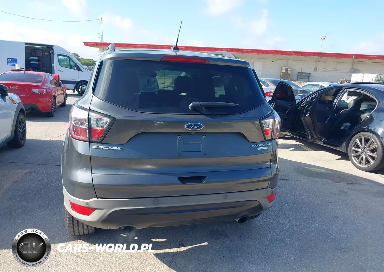 2017 Ford Escape Titanium VIN:1FMCU0J9XHUF10645 - 16