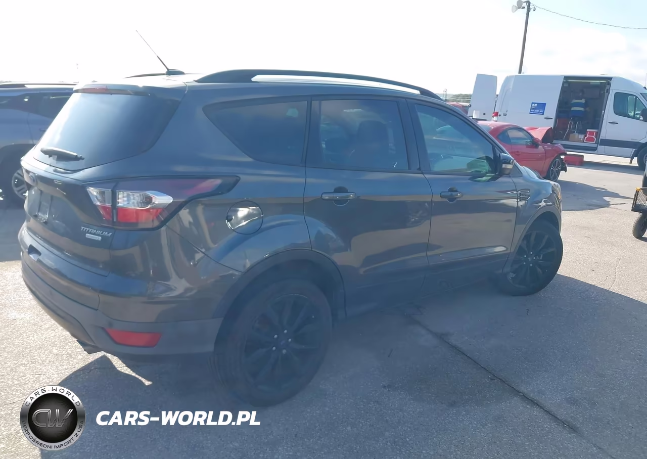 2017 Ford Escape Titanium VIN:1FMCU0J9XHUF10645 - 4