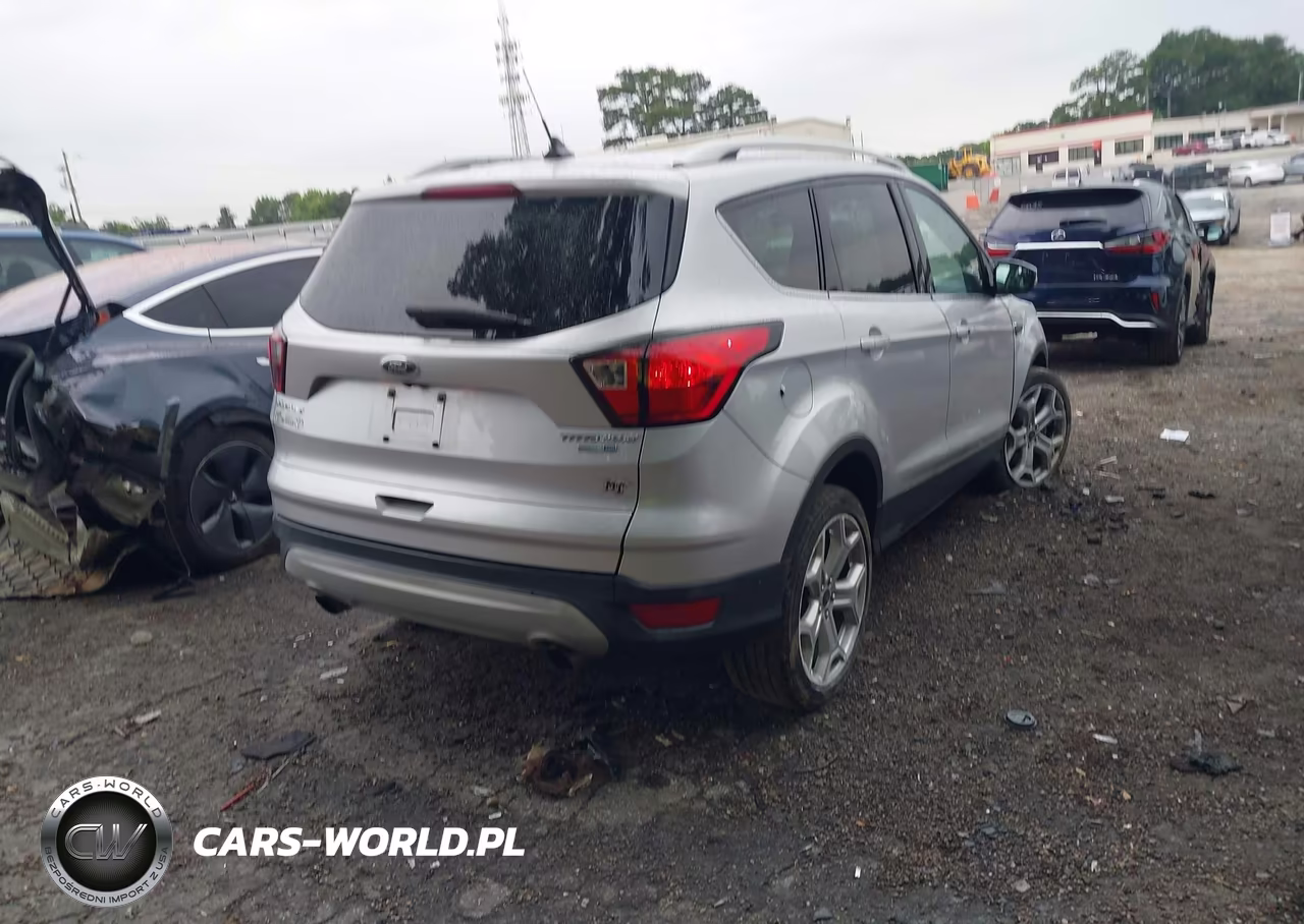 2019 Ford Escape Titanium VIN:1FMCU9J96KUC57609 - 4