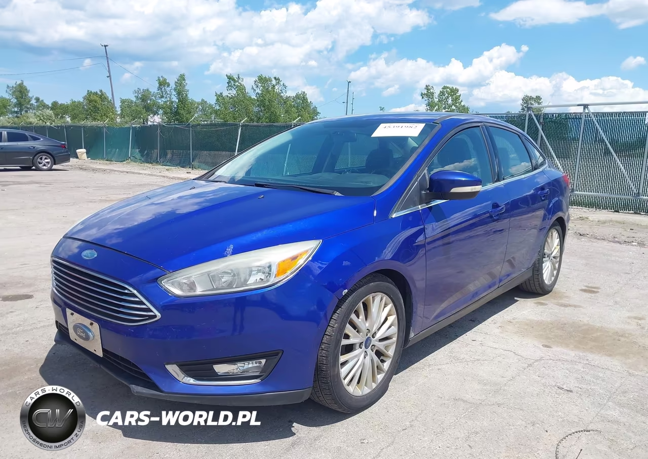 2015 Ford Focus Titanium VIN:1FADP3J28FL275241 - 2