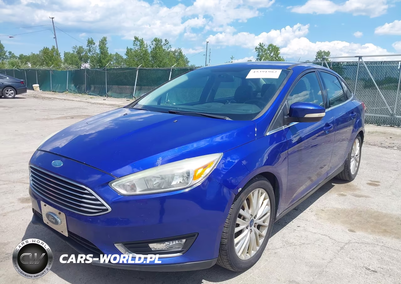 2015 Ford Focus Titanium VIN:1FADP3J28FL275241 - 6