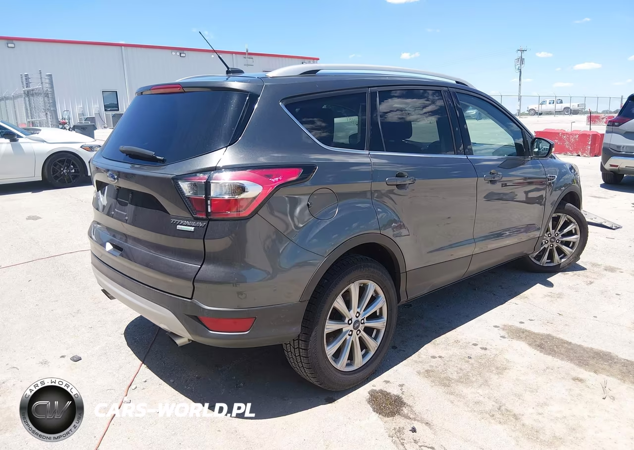 2017 Ford Escape Titanium VIN:1FMCU0JD7HUE54412 - 4