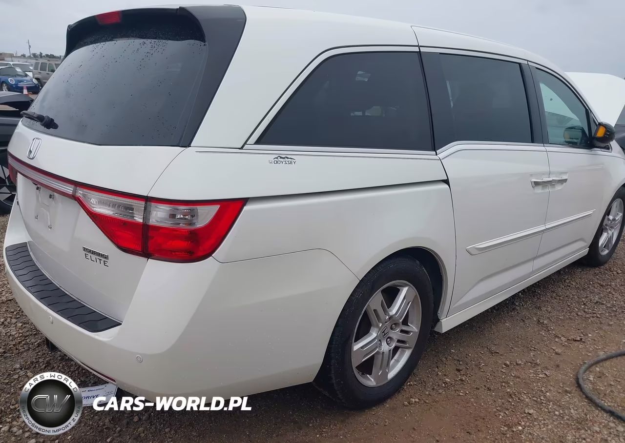 2012 Honda Odyssey Touring-Touring Elite VIN:5FNRL5H95CB118923 - 4