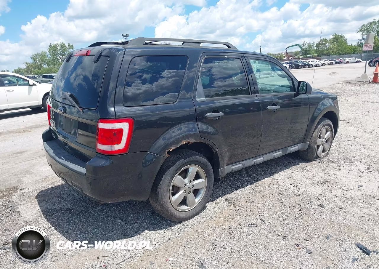 2011 Ford Escape Xlt VIN:1FMCU0D72BKB51594 - 4