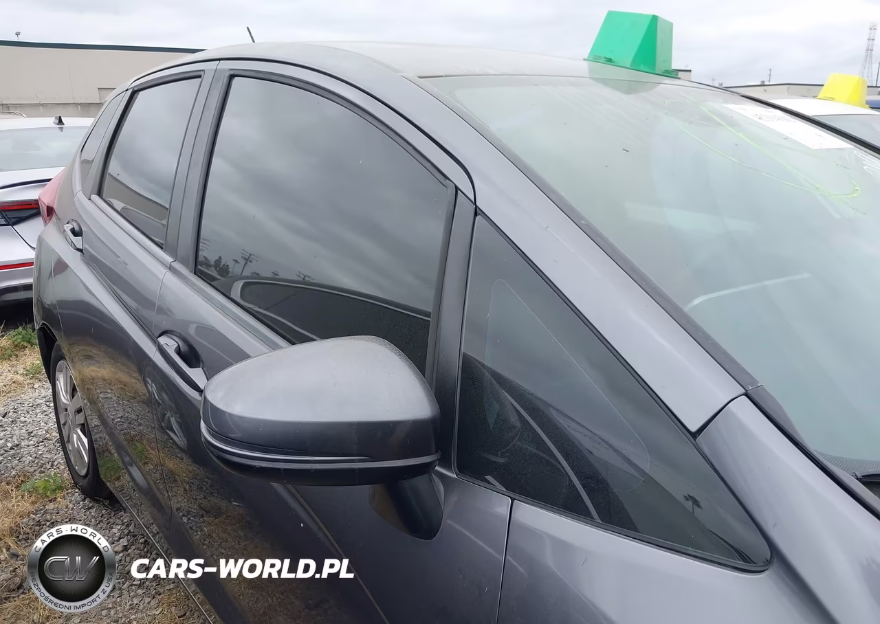 2015 Honda Fit Lx VIN:3HGGK5H52FM705878 - 14