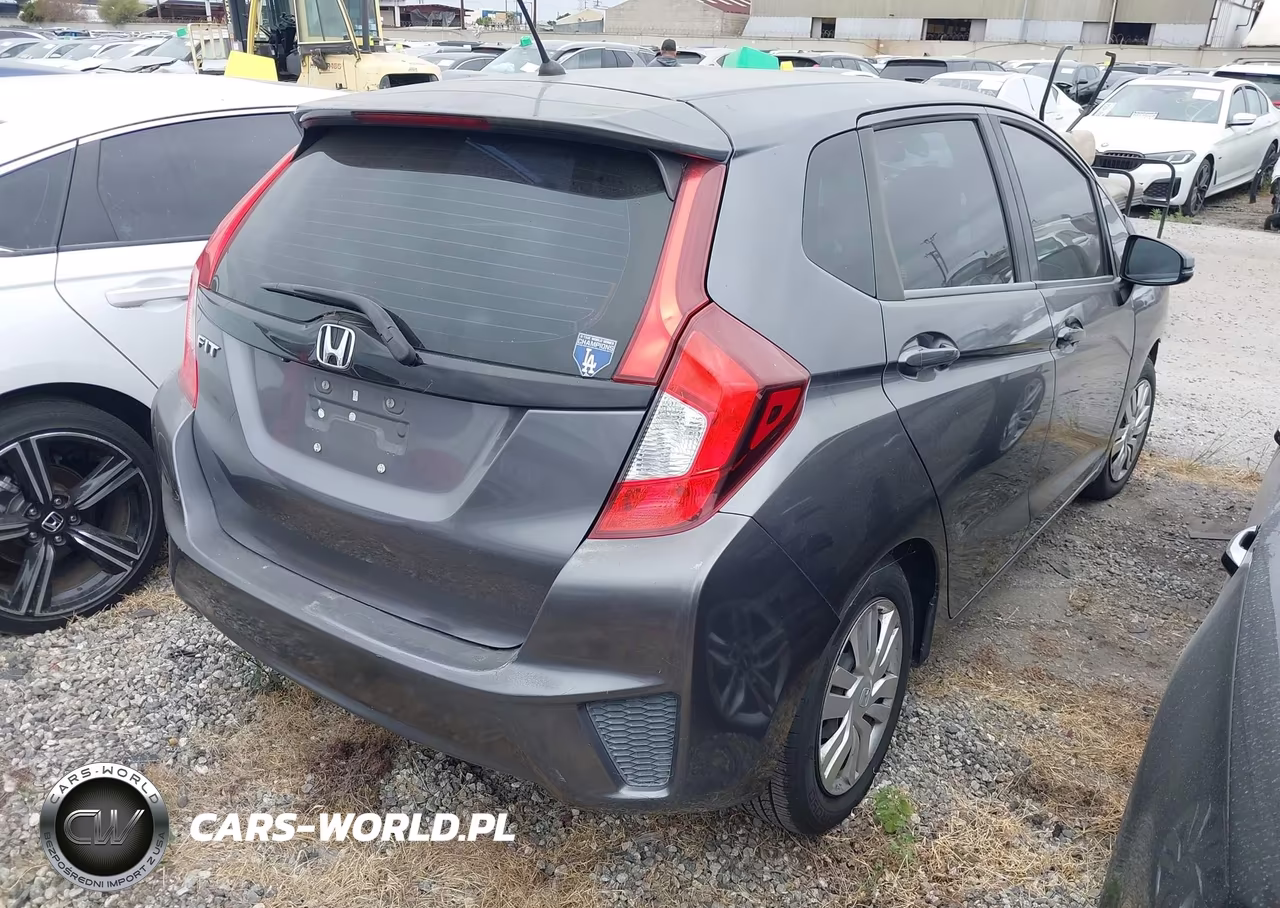 2015 Honda Fit Lx VIN:3HGGK5H52FM705878 - 4
