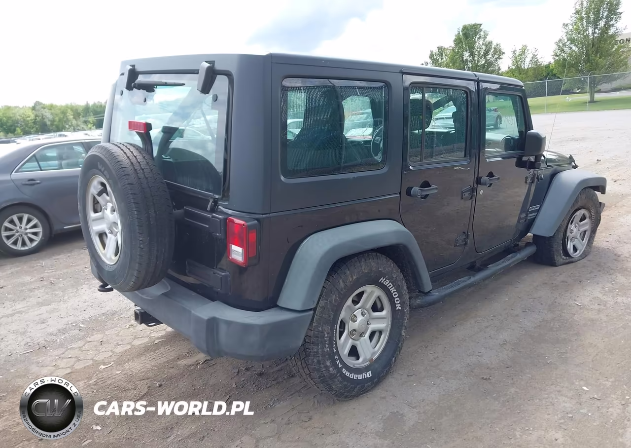 2015 Jeep Wrangler Unlimited Sport VIN:1C4BJWDGXFL562267 - 4
