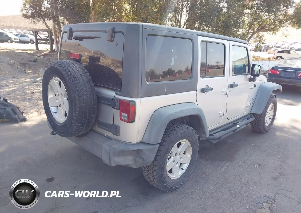 2011 Jeep Wrangler Unlimited Sport VIN:1J4BA3H10BL519419 - 4