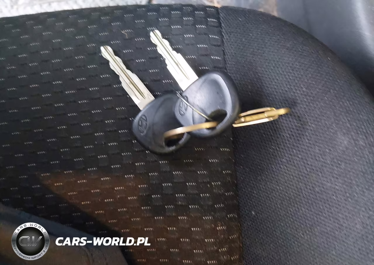 2009 Hyundai Accent Gs VIN:KMHCM36C49U125606 - 11