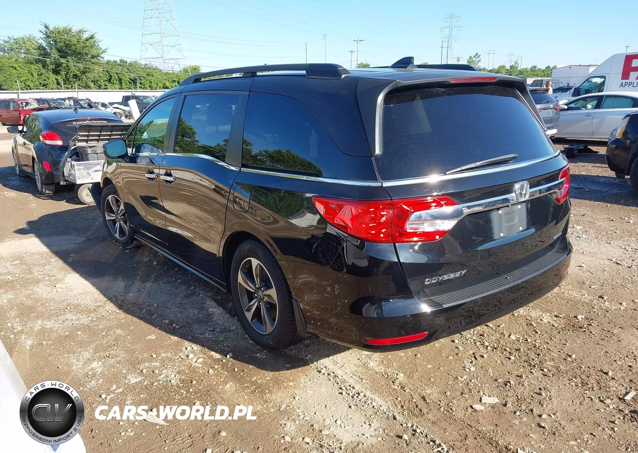 2019 Honda Odyssey Touring VIN:5FNRL6H89KB095576 - 3
