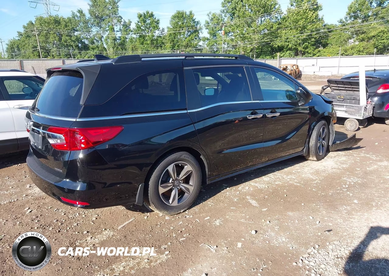 2019 Honda Odyssey Touring VIN:5FNRL6H89KB095576 - 4