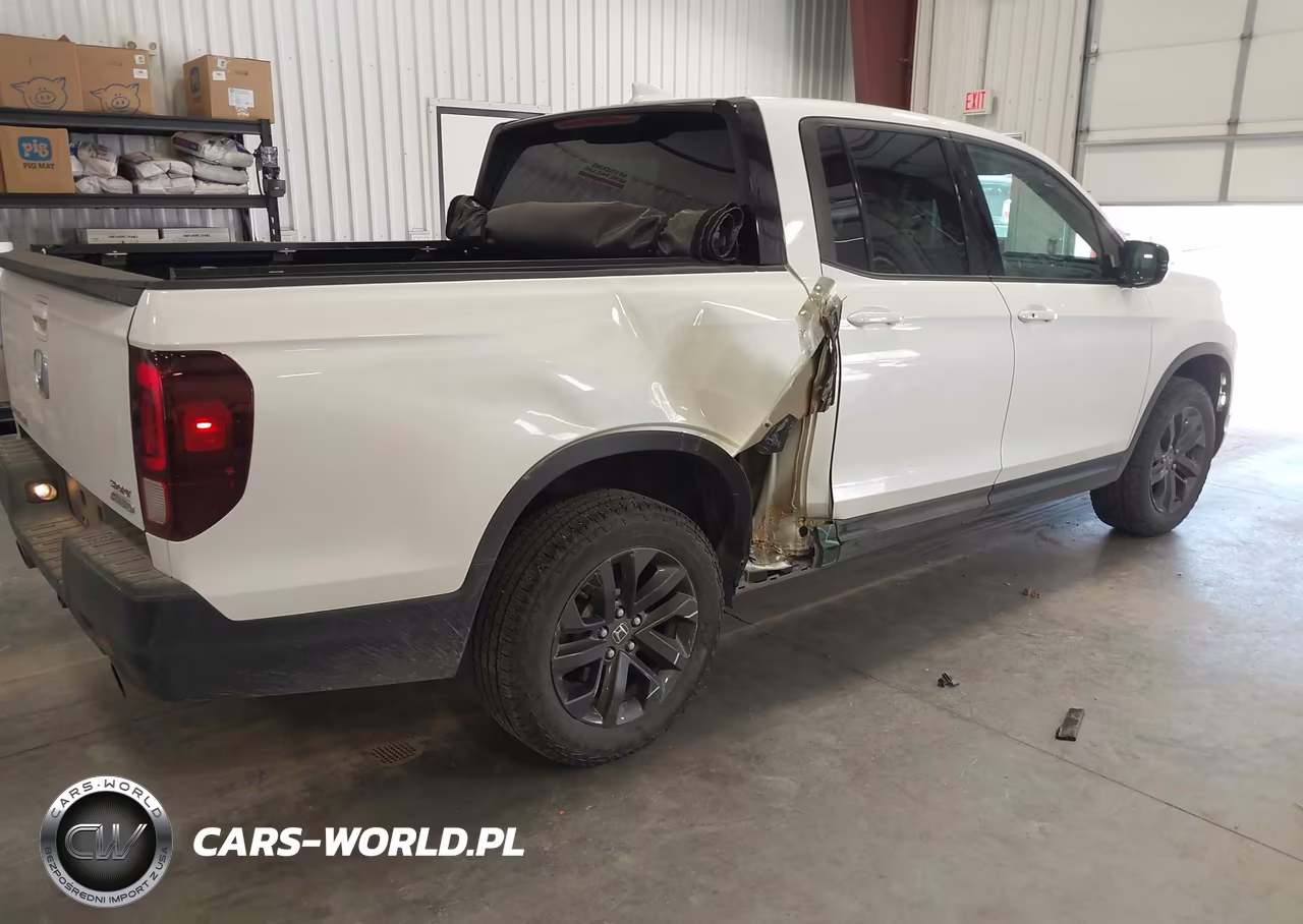 2023 Honda Ridgeline Sport VIN:5FPYK3F15PB062690 - 4