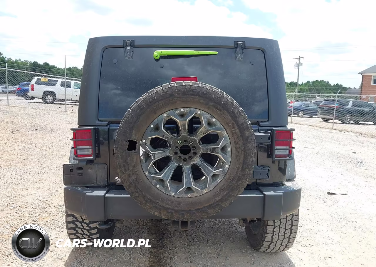 2014 Jeep Wrangler Unlimited Sport VIN:1C4BJWDG1EL162340 - 16