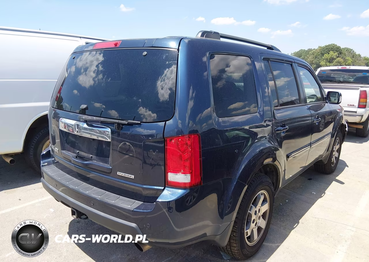 2011 Honda Pilot Touring VIN:5FNYF3H96BB043977 - 4