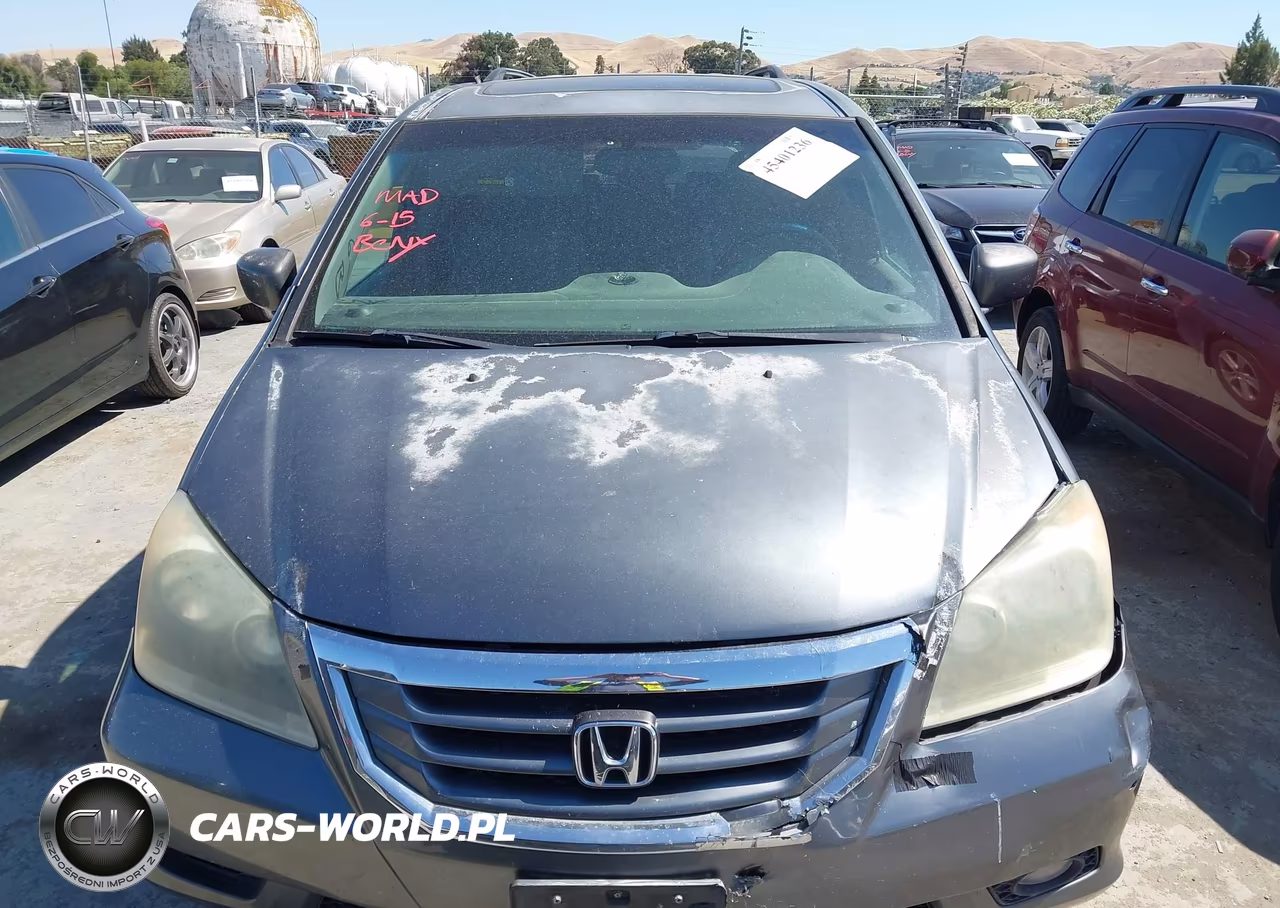 2010 Honda Odyssey Touring VIN:5FNRL3H92AB063946 - 12