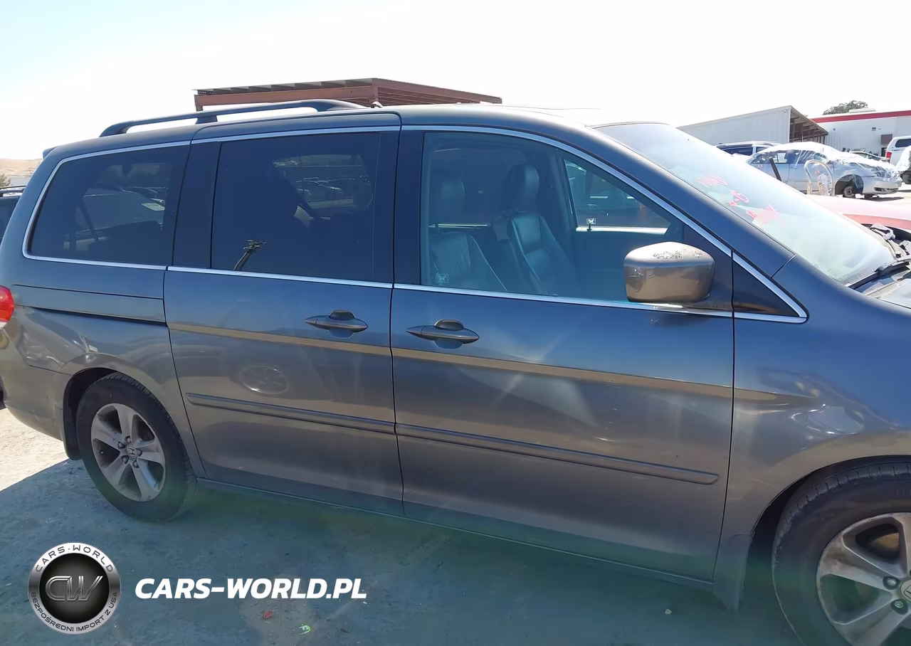 2010 Honda Odyssey Touring VIN:5FNRL3H92AB063946 - 13