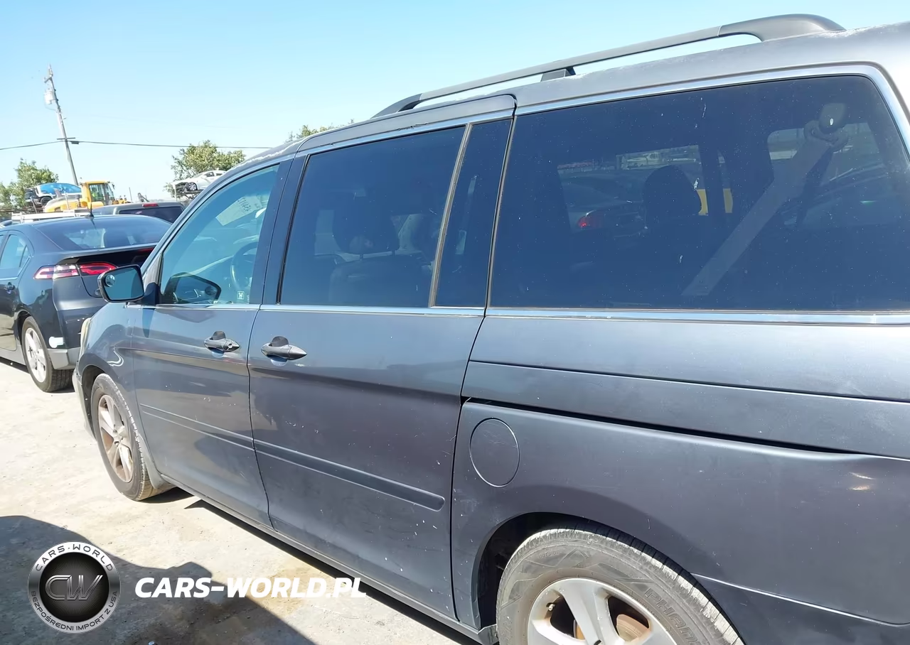 2010 Honda Odyssey Touring VIN:5FNRL3H92AB063946 - 14
