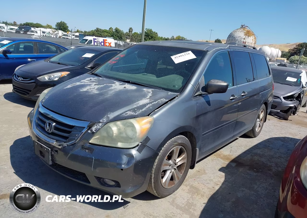 2010 Honda Odyssey Touring VIN:5FNRL3H92AB063946 - 2
