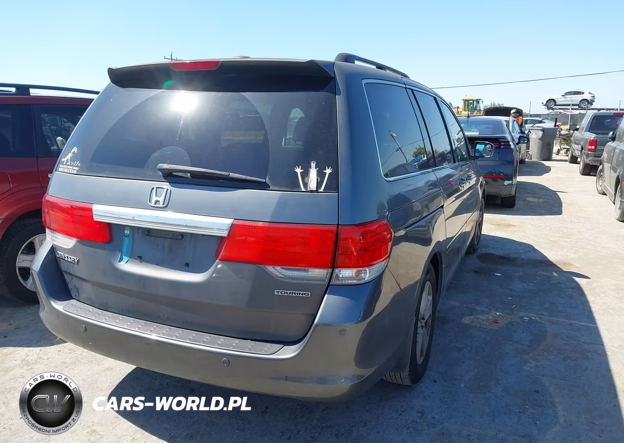 2010 Honda Odyssey Touring VIN:5FNRL3H92AB063946 - 4