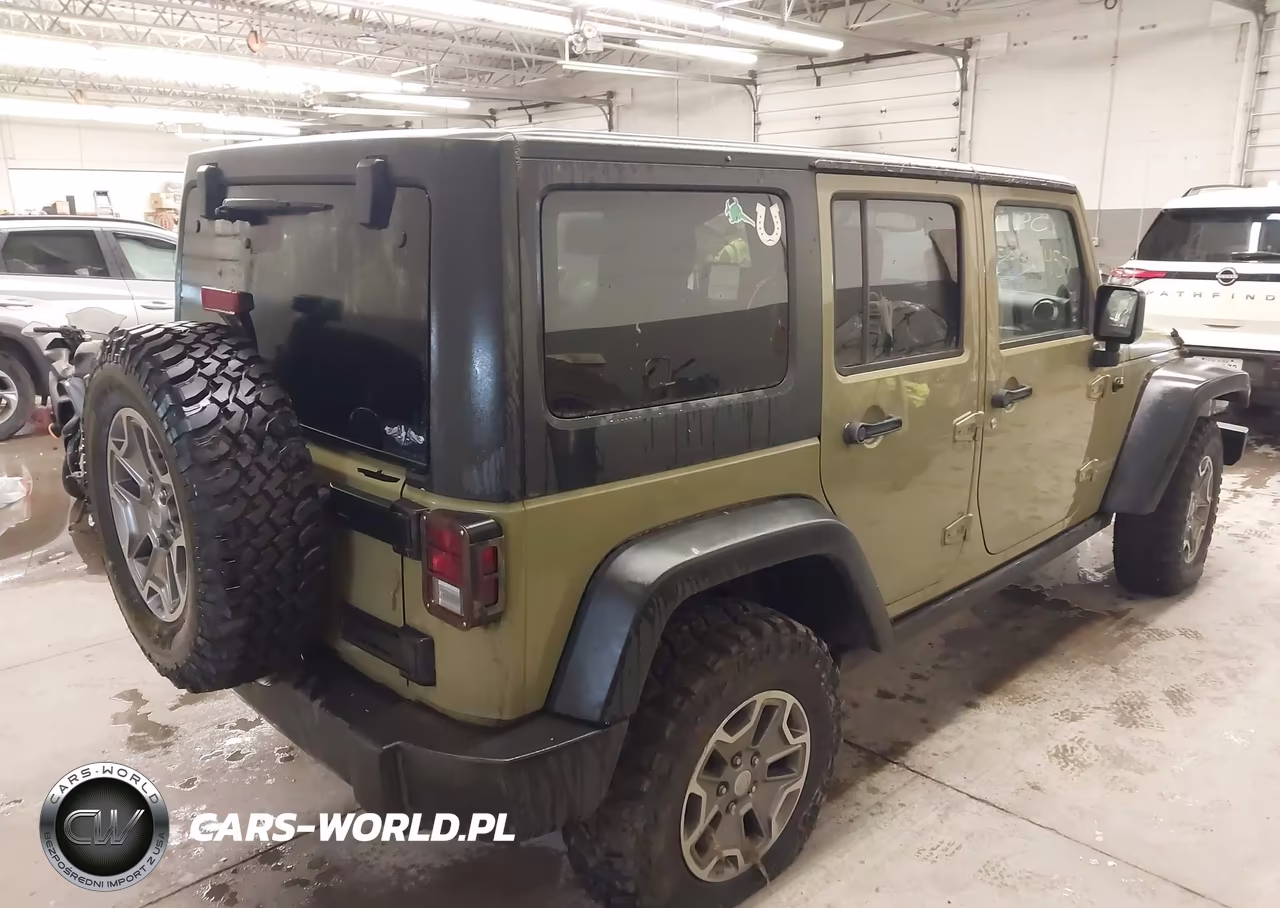 2013 Jeep Wrangler Unlimited Rubicon VIN:1C4HJWFG2DL554362 - 4