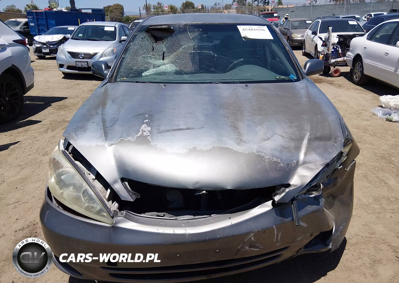 2002 Toyota Camry Le VIN:JTDBE32KX20099570 - 12