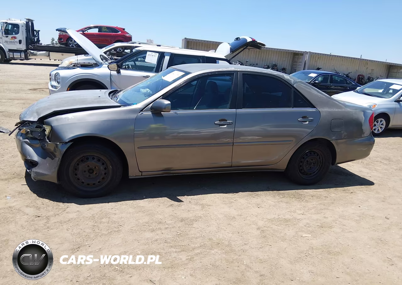 2002 Toyota Camry Le VIN:JTDBE32KX20099570 - 14