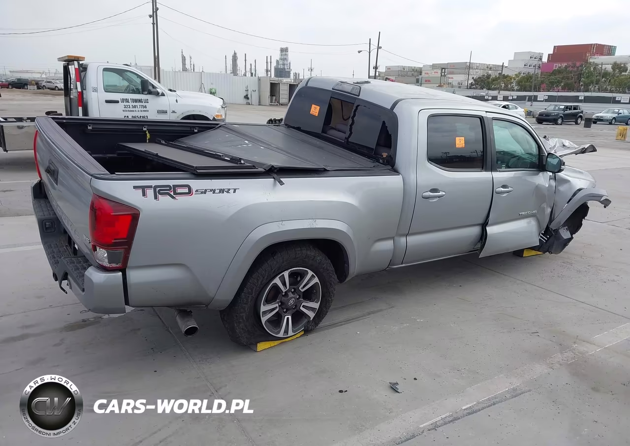 2018 Toyota Tacoma VIN:3TMBZ5DN8JM014518 - 4