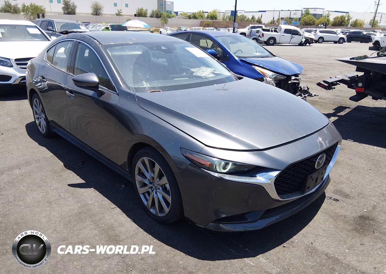 2020 Mazda Mazda3 Premium Package VIN:JM1BPAEM9L1166750 - 13