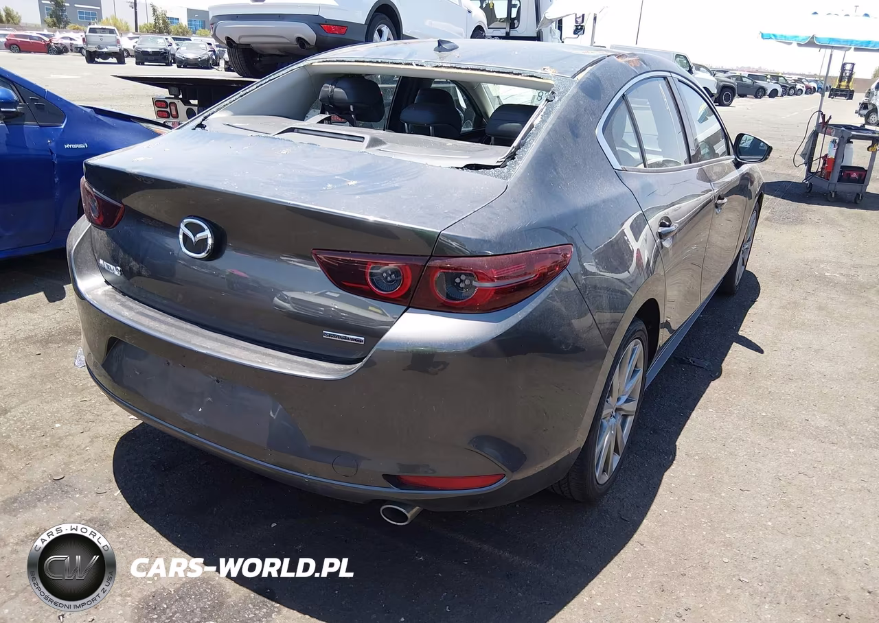 2020 Mazda Mazda3 Premium Package VIN:JM1BPAEM9L1166750 - 4