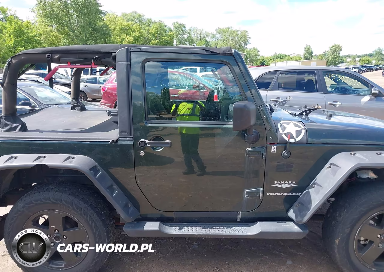 2010 Jeep Wrangler Sahara VIN:1J4AA5D1XAL191308 - 13