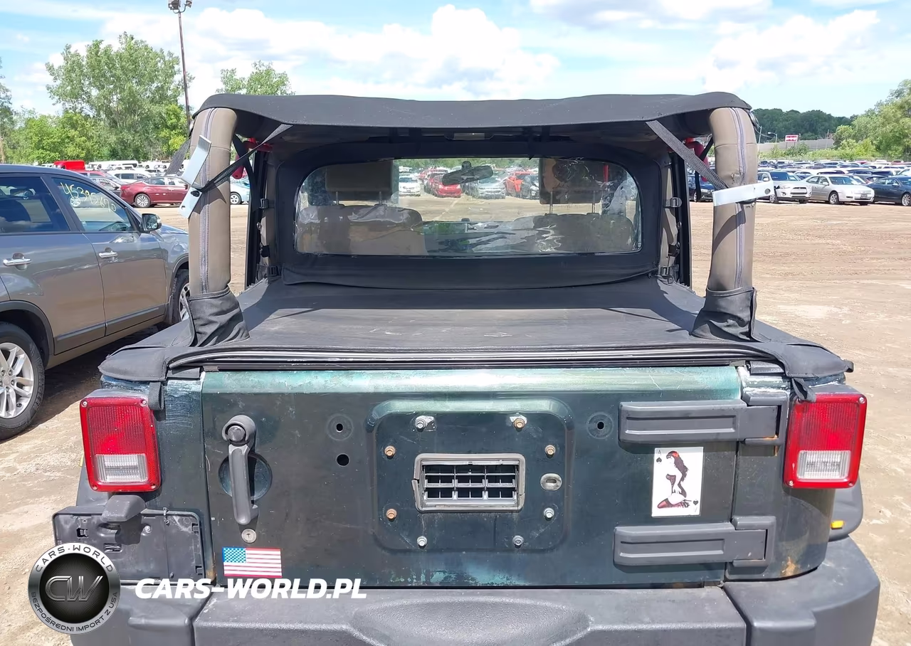 2010 Jeep Wrangler Sahara VIN:1J4AA5D1XAL191308 - 16