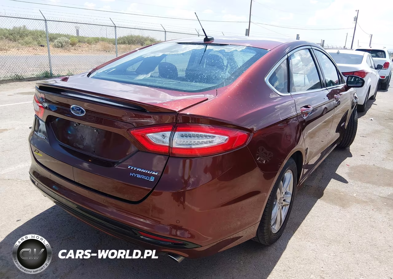 2015 Ford Fusion Hybrid Titanium VIN:3FA6P0RU4FR224141 - 4
