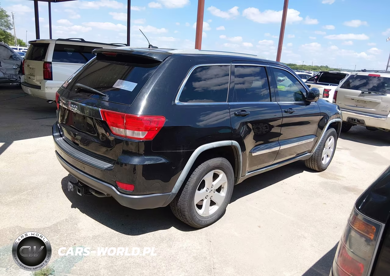 2012 Jeep Grand Cherokee Laredo VIN:1C4RJEAGXCC215403 - 4