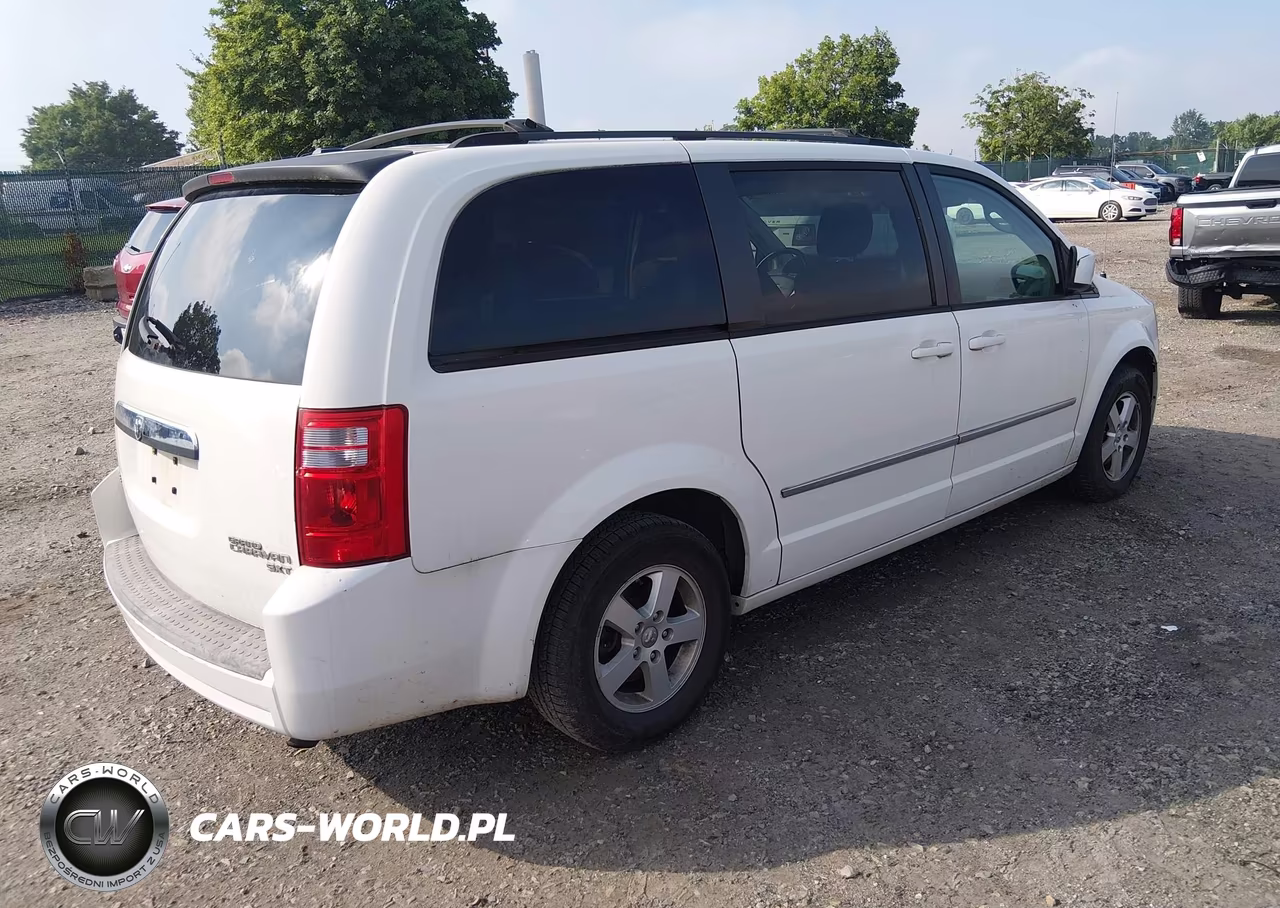 2010 Dodge Grand Caravan Sxt VIN:2D4RN5D10AR155053 - 4