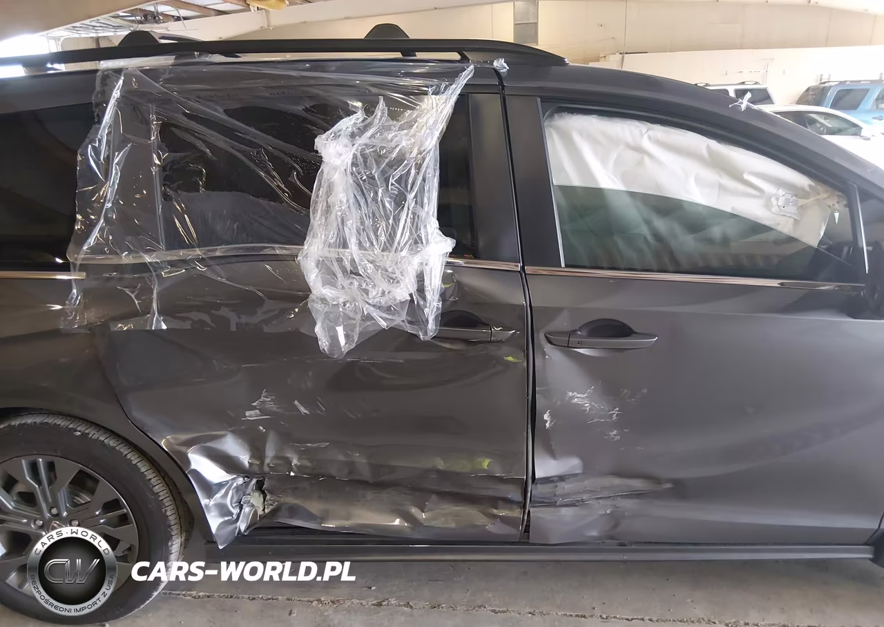 2026 Honda Odyssey Touring VIN:5FNRL6H86TB052038 - 13