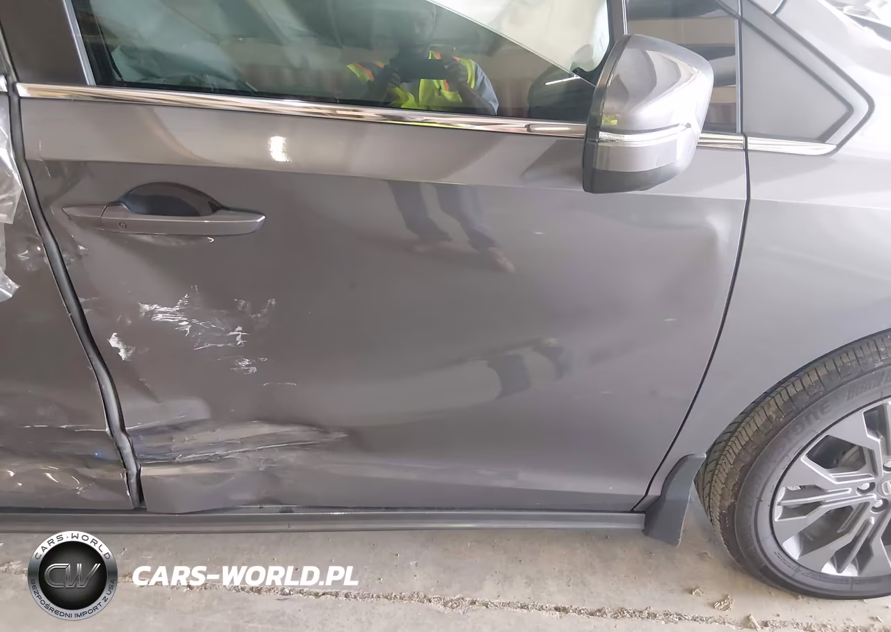 2026 Honda Odyssey Touring VIN:5FNRL6H86TB052038 - 6
