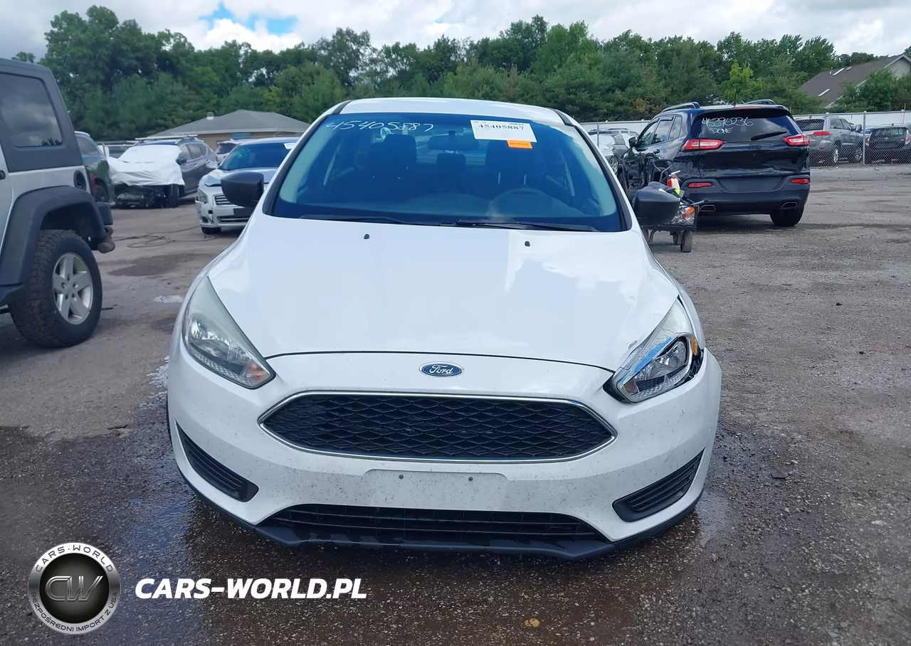 2015 Ford Focus S VIN:1FADP3E29FL323095 - 12