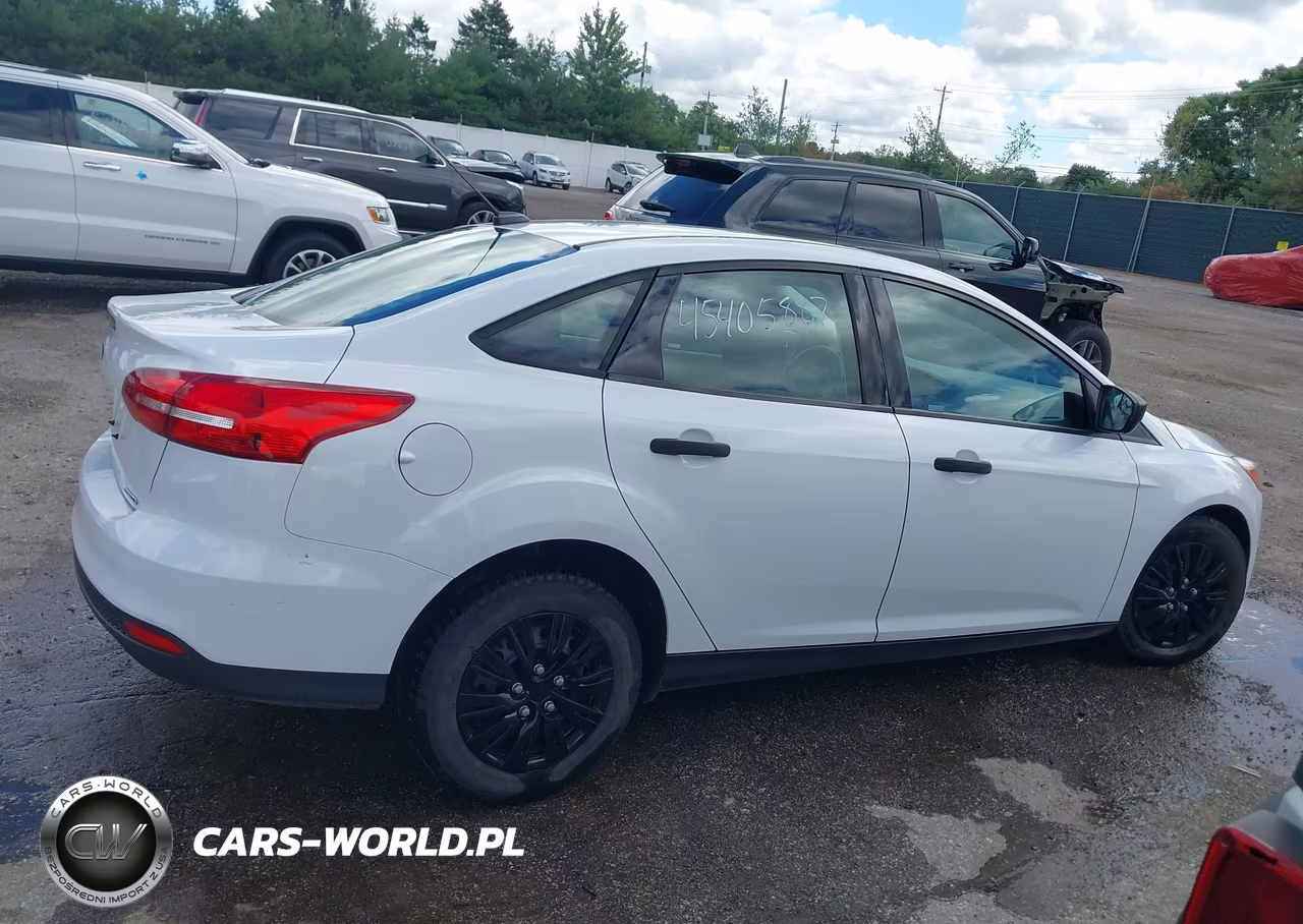 2015 Ford Focus S VIN:1FADP3E29FL323095 - 13