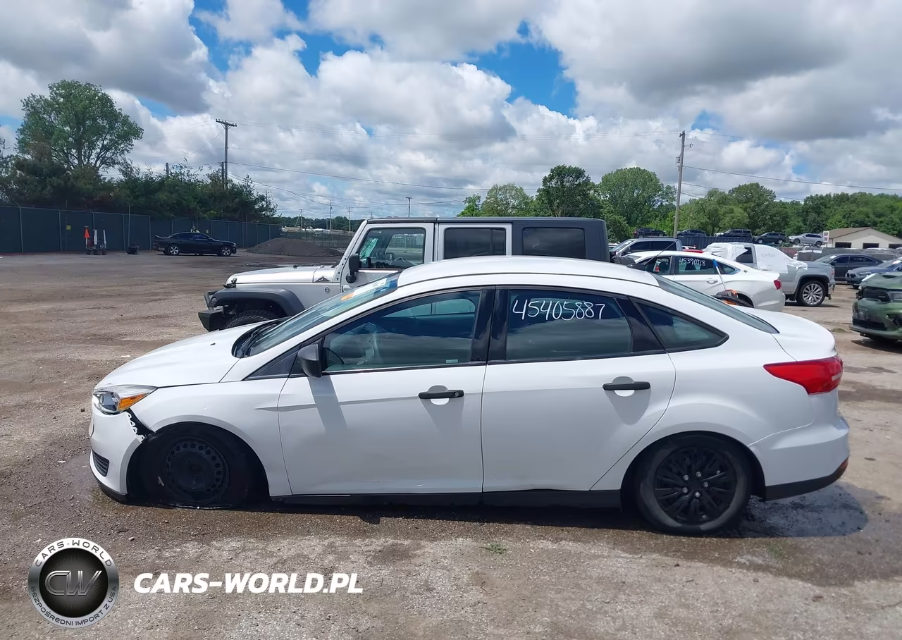 2015 Ford Focus S VIN:1FADP3E29FL323095 - 14