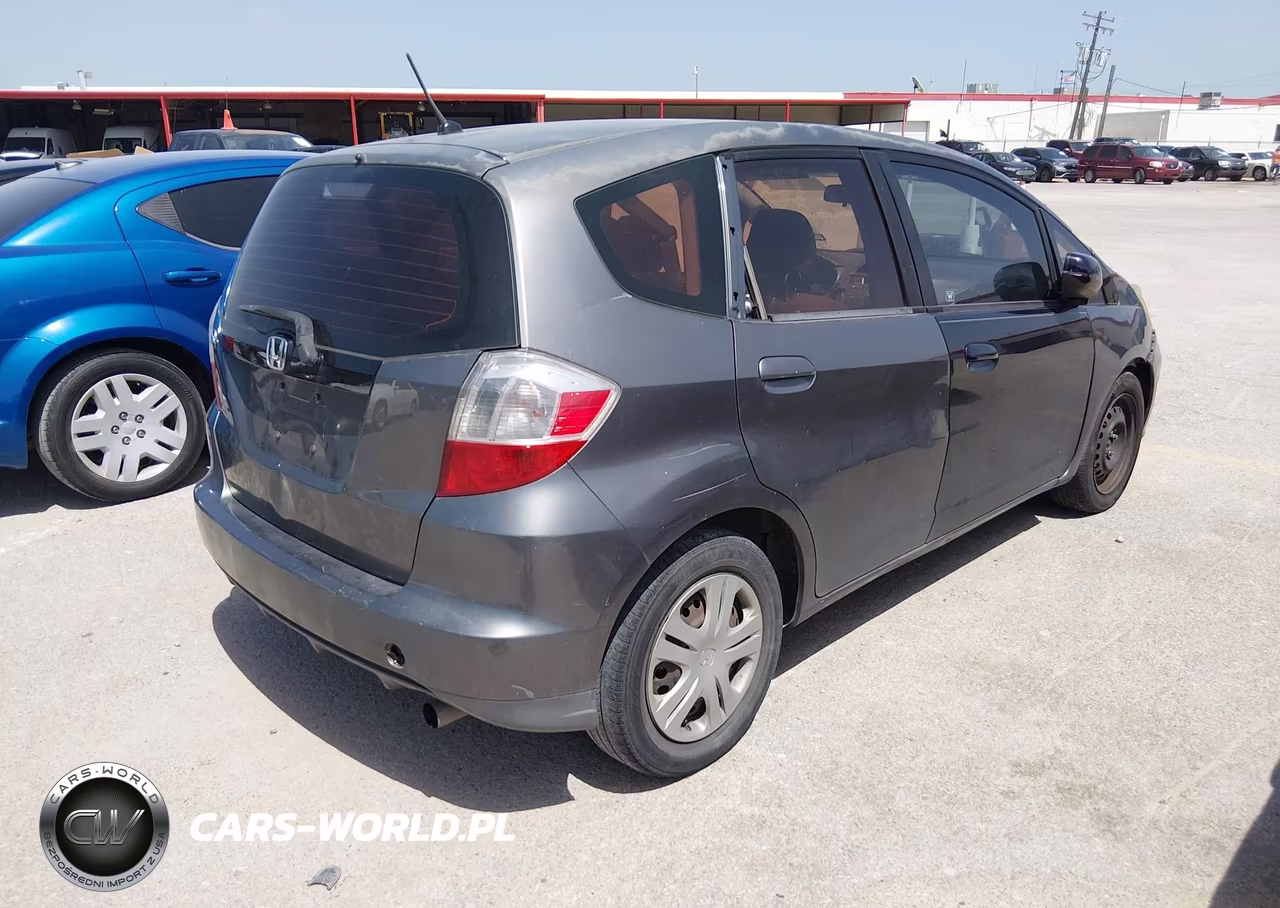 2011 Honda Fit VIN:JHMGE8H3XBS002955 - 4