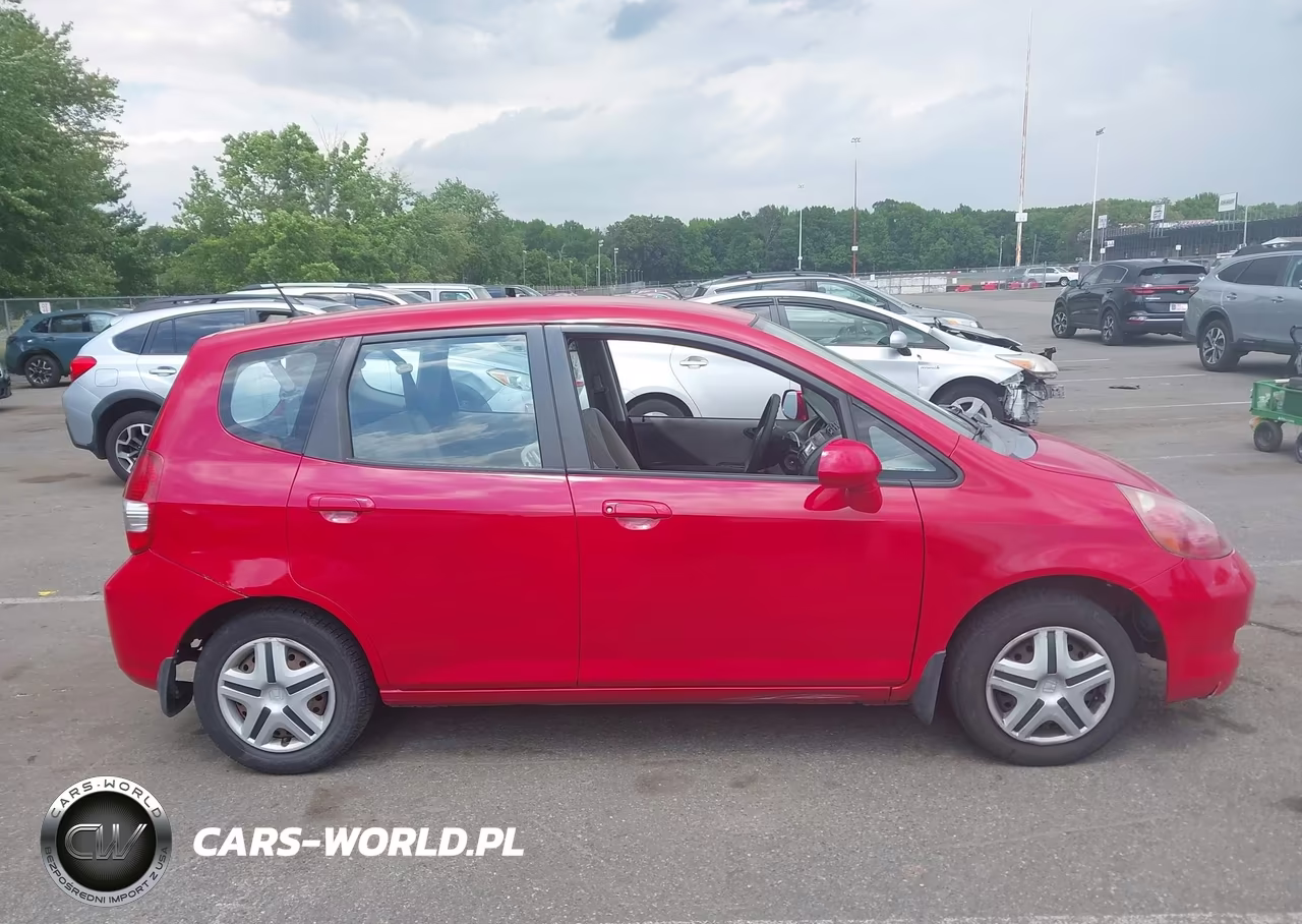 2007 Honda Fit VIN:JHMGD38427S055154 - 13