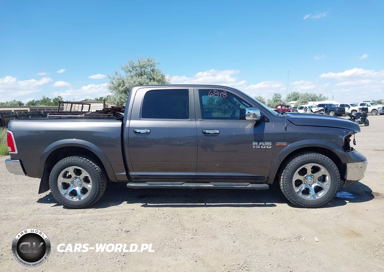 2015 Ram 1500 Laramie VIN:1C6RR7NT1FS643857 - 14