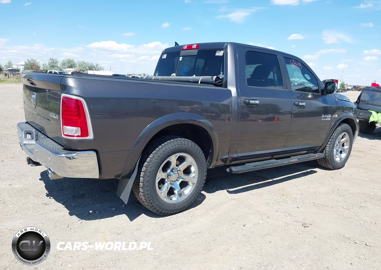 2015 Ram 1500 Laramie VIN:1C6RR7NT1FS643857 - 4