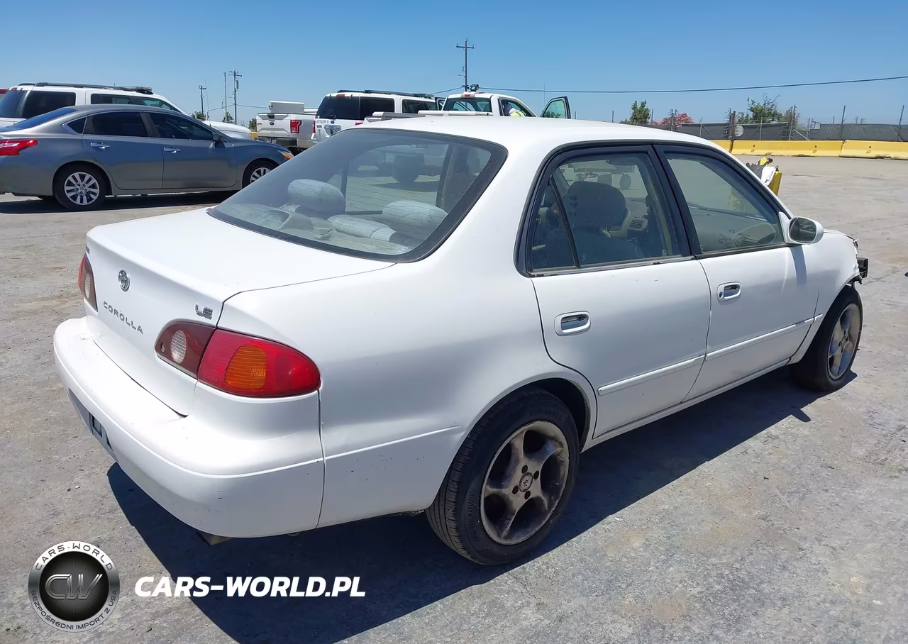 2001 Toyota Corolla Le VIN:1NXBR12E21Z520669 - 4