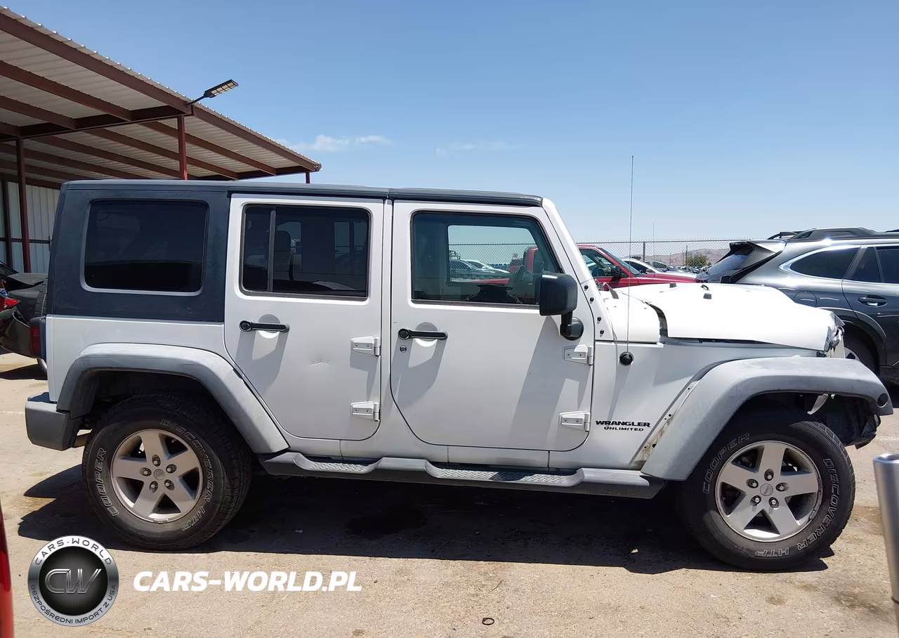2009 Jeep Wrangler Unlimited X VIN:1J4GA39199L736174 - 13