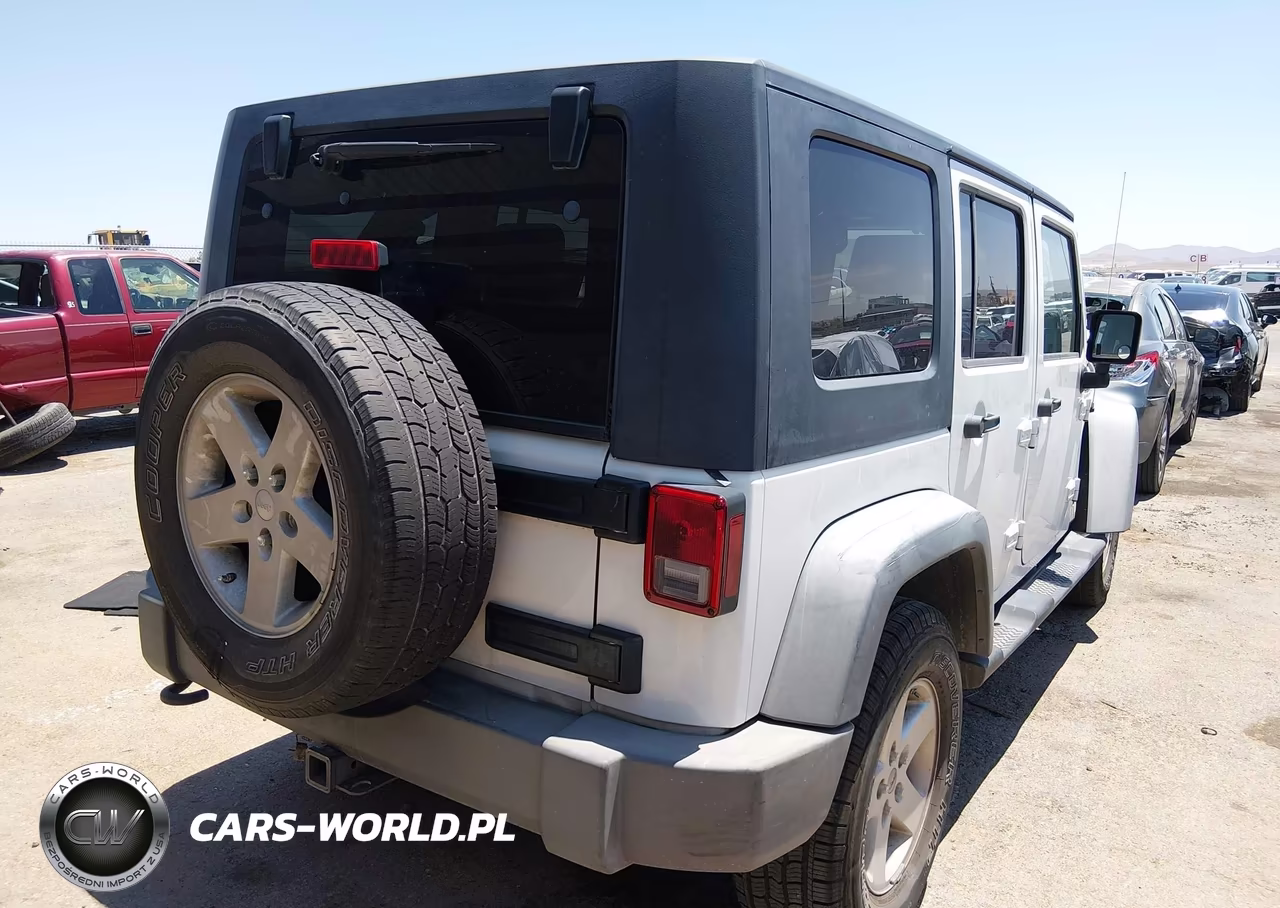 2009 Jeep Wrangler Unlimited X VIN:1J4GA39199L736174 - 4
