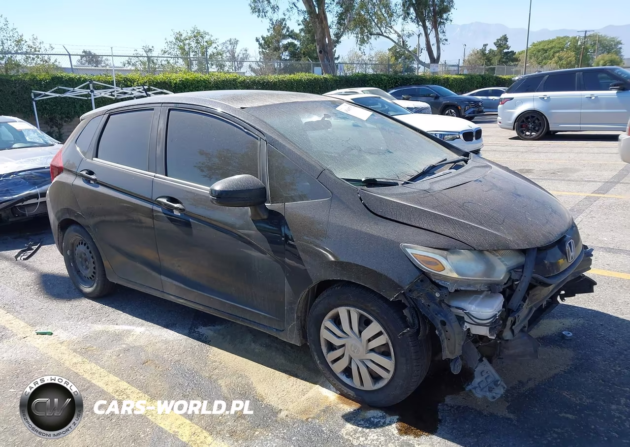 2015 Honda Fit Lx VIN:3HGGK5H52FM750061 - 1