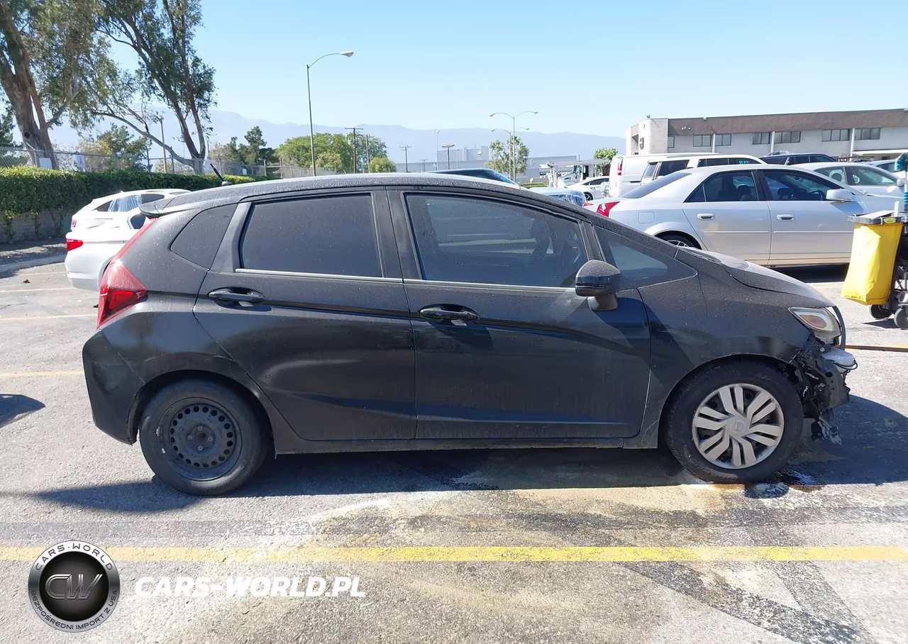 2015 Honda Fit Lx VIN:3HGGK5H52FM750061 - 14
